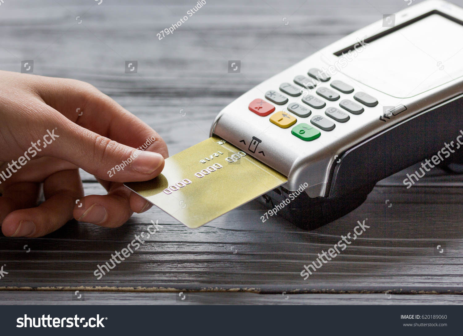 stock-photo-payment-terminal-with-card-on-table-background